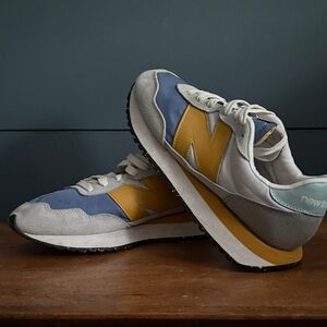 New Balance Blue and Gold Athletic Shoes